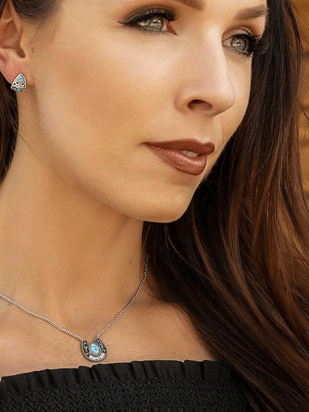 Montana Silversmiths NC5121 Womens Mackenzie Horse Pendant Necklace Silver on model. If you need any assistance with this item or the purchase of this item please call us at five six one seven four eight eight eight zero one Monday through Saturday 10:00a.m EST to 8:00 p.m EST