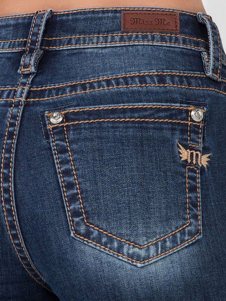 Miss Me H3636B86 Womens High-Rise Boot Jean Dark Blue back pocket close up. If you need any assistance with this item or the purchase of this item please call us at five six one seven four eight eight eight zero one Monday through Saturday 10:00a.m EST to 8:00 p.m EST