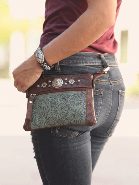 American West 9378884 Ladies Trail Rider Hip Crossbody Bag Light Turquoise on hip style. If you need any assistance with this item or the purchase of this item please call us at five six one seven four eight eight eight zero one Monday through Saturday 10:00a.m EST to 8:00 p.m EST