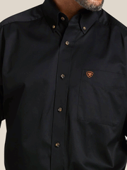Ariat 10000502 Mens Solid Twill Classic Fit Shirt Black close up of front. If you need any assistance with this item or the purchase of this item please call us at five six one seven four eight eight eight zero one Monday through Saturday 10:00a.m EST to 8:00 p.m EST