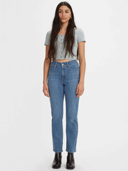 Levi's 392500082 Womens Classic Straight Fit Jean Medium Wash full front view of model. If you need any assistance with this item or the purchase of this item please call us at five six one seven four eight eight eight zero one Monday through Saturday 10:00a.m EST to 8:00 p.m EST