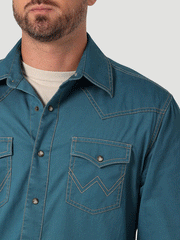 Wrangler 112330785 Mens Retro Long Sleeve Shirt Mallard Blu pocket and collar close up view. If you need any assistance with this item or the purchase of this item please call us at five six one seven four eight eight eight zero one Monday through Saturday 10:00a.m EST to 8:00 p.m EST