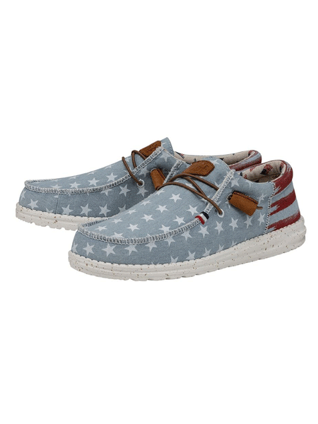 Hey Dude 40395-4NR Mens Wally Americana Shoe Denim Star front and side view. If you need any assistance with this item or the purchase of this item please call us at five six one seven four eight eight eight zero one Monday through Saturday 10:00a.m EST to 8:00 p.m EST