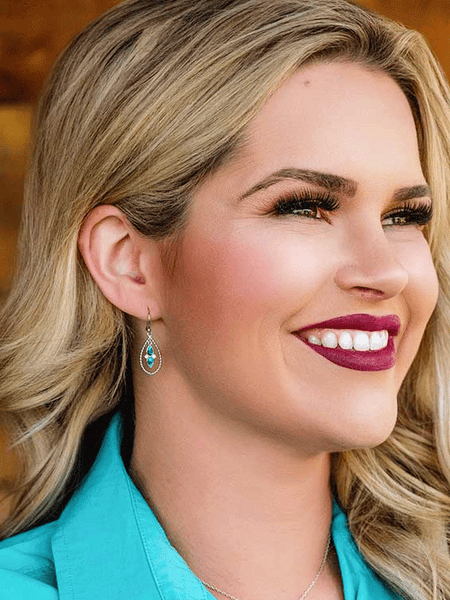 Montana Silversmiths ER5956 Womens Moonlit Ocean Turquoise Earrings Silver on model. If you need any assistance with this item or the purchase of this item please call us at five six one seven four eight eight eight zero one Monday through Saturday 10:00a.m EST to 8:00 p.m EST