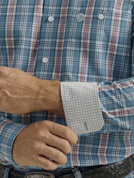 Wrangler 112331805 Mens George Strait Collection Long Sleeve Shirt Blue contrast cuff close up view. If you need any assistance with this item or the purchase of this item please call us at five six one seven four eight eight eight zero one Monday through Saturday 10:00a.m EST to 8:00 p.m EST