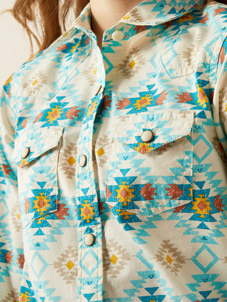 Ariat 10060390 Kids Remy Long Sleeve Snap Shirt Cayo Print Turquoise front close up. If you need any assistance with this item or the purchase of this item please call us at five six one seven four eight eight eight zero one Monday through Saturday 10:00a.m EST to 8:00 p.m EST