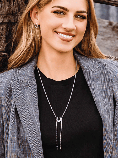 Montana Silversmiths NC6120 Womens Between Luck Necklace Silver on model. If you need any assistance with this item or the purchase of this item please call us at five six one seven four eight eight eight zero one Monday through Saturday 10:00a.m EST to 8:00 p.m EST