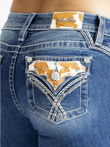 Miss Me M3444B117 Womens Mid Rise Boot Jean Medium Blue back pocket close up view. If you need any assistance with this item or the purchase of this item please call us at five six one seven four eight eight eight zero one Monday through Saturday 10:00a.m EST to 8:00 p.m EST