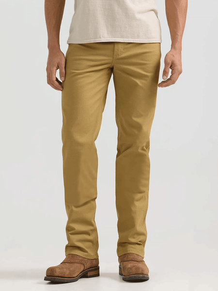 Wrangler 112361473 Mens Premium Performance Tough Comfort Cowboy Cut Slim Fit Canvas Jean Kelp front view. If you need any assistance with this item or the purchase of this item please call us at five six one seven four eight eight eight zero one Monday through Saturday 10:00a.m EST to 8:00 p.m EST