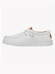 Hey Dude 40296-100 Mens Wally Washed Canvas Shoe White side view. If you need any assistance with this item or the purchase of this item please call us at five six one seven four eight eight eight zero one Monday through Saturday 10:00a.m EST to 8:00 p.m EST