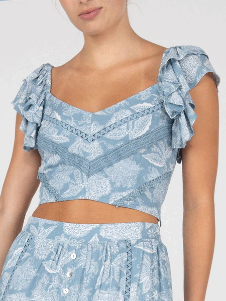 Miss Me MT2877S Womens Cropped Ruffled Floral Top Light Blue front view. If you need any assistance with this item or the purchase of this item please call us at five six one seven four eight eight eight zero one Monday through Saturday 10:00a.m EST to 8:00 p.m EST