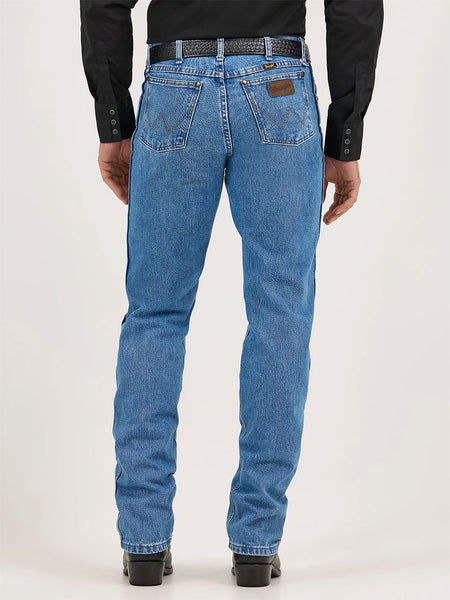 Wrangler 47MWZSW Mens Premium Performance Cowboy Cut Regular Fit Jean Stonewash back view. If you need any assistance with this item or the purchase of this item please call us at five six one seven four eight eight eight zero one Monday through Saturday 10:00a.m EST to 8:00 p.m EST