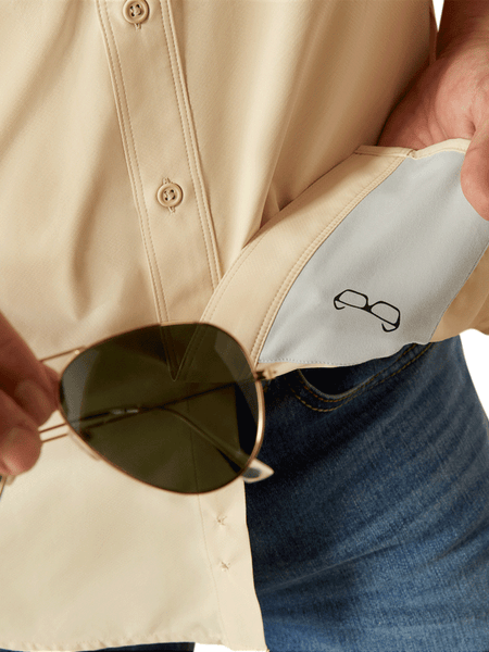 Ariat 10055228 Mens VentTEK Outbound Fitted Shirt Creme Brulee lens cloth view. If you need any assistance with this item or the purchase of this item please call us at five six one seven four eight eight eight zero one Monday through Saturday 10:00a.m EST to 8:00 p.m EST