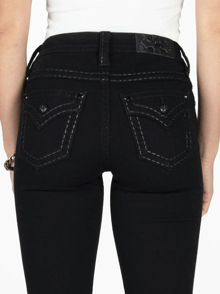 Miss Me M5014B397 Womens Classic Mid Rise Bootcut Jean Black back close up view. If you need any assistance with this item or the purchase of this item please call us at five six one seven four eight eight eight zero one Monday through Saturday 10:00a.m EST to 8:00 p.m EST