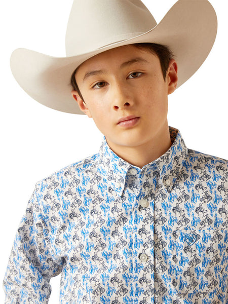 riat 10047296 Kids Peerce Classic Fit Shirt Blue close up. If you need any assistance with this item or the purchase of this item please call us at five six one seven four eight eight eight zero one Monday through Saturday 10:00a.m EST to 8:00 p.m EST