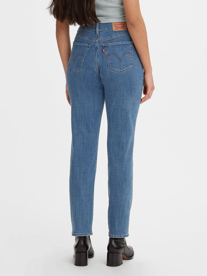Levi's 392500082 Womens Classic Straight Fit Jean Medium Wash front view. If you need any assistance with this item or the purchase of this item please call us at five six one seven four eight eight eight zero one Monday through Saturday 10:00a.m EST to 8:00 p.m EST