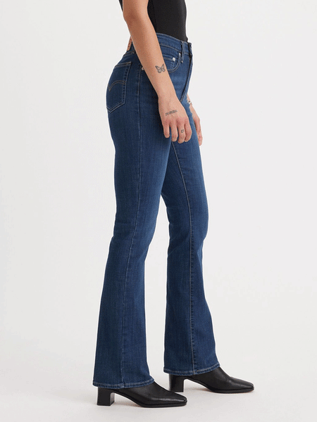 Levi's 187590038 Womens 725 High Rise Bootcut Jeans Lapis Dark Horse Navy side view. If you need any assistance with this item or the purchase of this item please call us at five six one seven four eight eight eight zero one Monday through Saturday 10:00a.m EST to 8:00 p.m EST