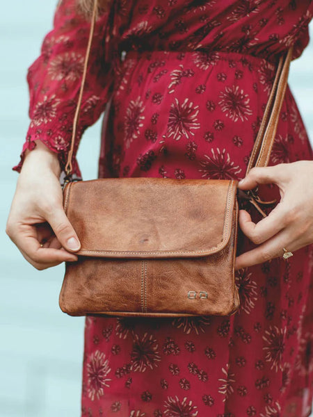 Bed Stu A694440-TNRS-X Womens Ziggy Crossbody Handbag Tan Rustic front view on model. If you need any assistance with this item or the purchase of this item please call us at five six one seven four eight eight eight zero one Monday through Saturday 10:00a.m EST to 8:00 p.m EST
