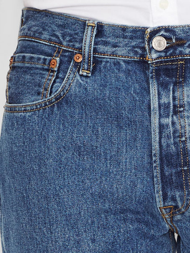 Levi’s 005010193 Mens 501 Original Fit Jeans Medium Stonewash front view. If you need any assistance with this item or the purchase of this item please call us at five six one seven four eight eight eight zero one Monday through Saturday 10:00a.m EST to 8:00 p.m EST