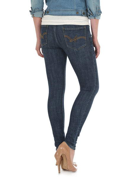 Wrangler 09MWSSS Womens Mid-Rise Skinny Jean Sunnyside back view. If you need any assistance with this item or the purchase of this item please call us at five six one seven four eight eight eight zero one Monday through Saturday 10:00a.m EST to 8:00 p.m EST