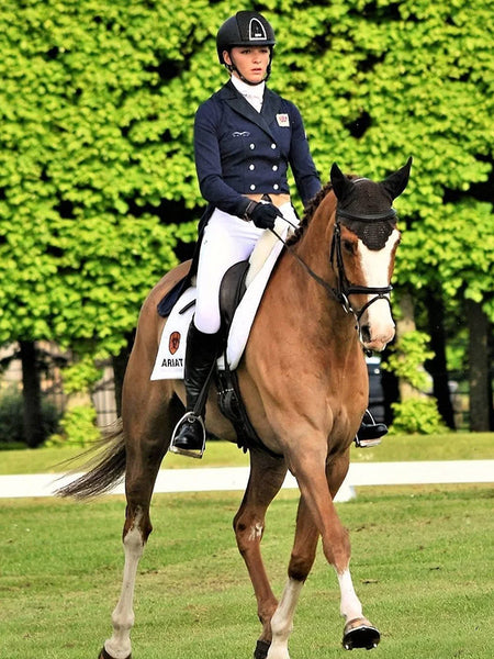 Ariat 10004372 Unisex Air Grip Gloves Black A girl riding a horse with Glove. If you need any assistance with this item or the purchase of this item please call us at five six one seven four eight eight eight zero one Monday through Saturday 10:00a.m EST to 8:00 p.m EST