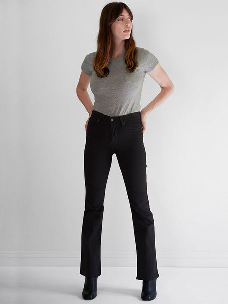 Levis 187590063 Womens High Rise Bootcut Jeans Soft Black front view on model. If you need any assistance with this item or the purchase of this item please call us at five six one seven four eight eight eight zero one Monday through Saturday 10:00a.m EST to 8:00 p.m EST