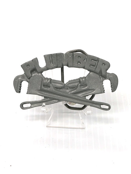 Spec Cast 1967 Plumber Solid Pewter Belt Buckle front view. If you need any assistance with this item or the purchase of this item please call us at five six one seven four eight eight eight zero one Monday through Saturday 10:00a.m EST to 8:00 p.m EST