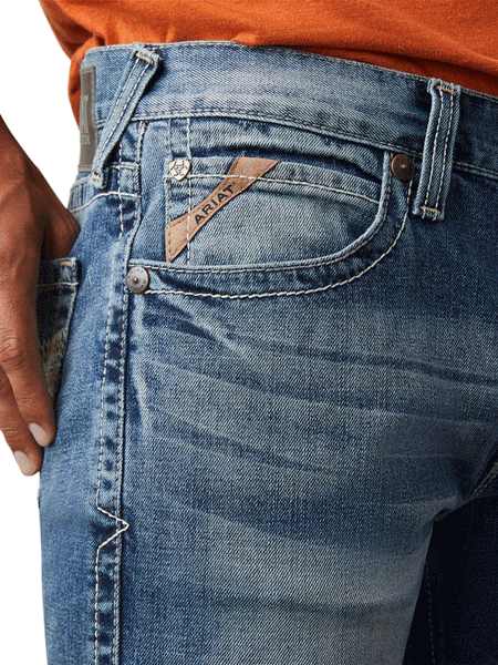 Ariat 10043185 Mens M8 Modern Williams Slim Leg Jean Dakota front pocket close up. If you need any assistance with this item or the purchase of this item please call us at five six one seven four eight eight eight zero one Monday through Saturday 10:00a.m EST to 8:00 p.m EST