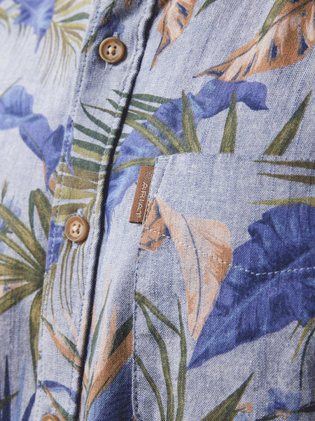 Ariat 10043710 Mens Paradise Palm Long Sleeve Shirt Chambray Blue front close up. If you need any assistance with this item or the purchase of this item please call us at five six one seven four eight eight eight zero one Monday through Saturday 10:00a.m EST to 8:00 p.m EST
