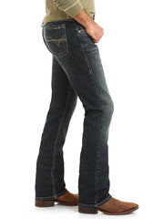 Wrangler 44MWXGD Mens 20X Slim Straight Jeans Glendive Blue side view. If you need any assistance with this item or the purchase of this item please call us at five six one seven four eight eight eight zero one Monday through Saturday 10:00a.m EST to 8:00 p.m EST