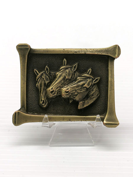 Colorado Silver Star 5104 Three Horseheads Brass Finish Belt Buckle  front view. If you need any assistance with this item or the purchase of this item please call us at five six one seven four eight eight eight zero one Monday through Saturday 10:00a.m EST to 8:00 p.m EST