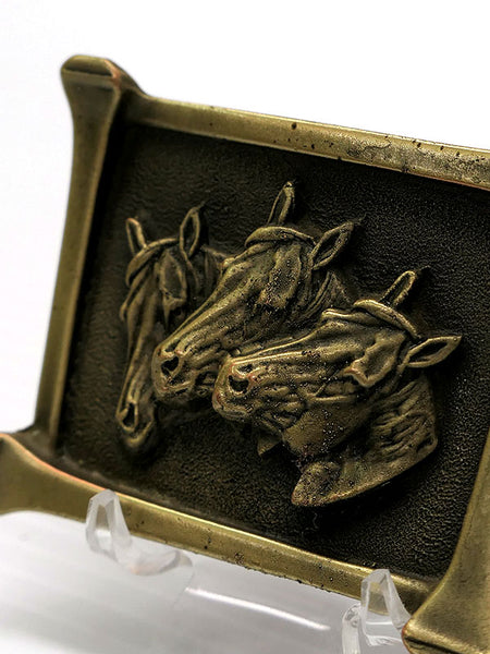 Colorado Silver Star 5104 Three Horseheads Brass Finish Belt Buckle front close up view. If you need any assistance with this item or the purchase of this item please call us at five six one seven four eight eight eight zero one Monday through Saturday 10:00a.m EST to 8:00 p.m EST