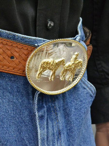 Montana Silversmiths 6250-35 Etched Mountains Western Belt Buckle with Pack Horse and Rider Silver on model. If you need any assistance with this item or the purchase of this item please call us at five six one seven four eight eight eight zero one Monday through Saturday 10:00a.m EST to 8:00 p.m EST