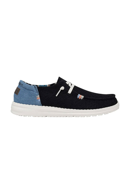 Hey Dude 121414790 Womens Wendy Boho Shoe Black side view. If you need any assistance with this item or the purchase of this item please call us at five six one seven four eight eight eight zero one Monday through Saturday 10:00a.m EST to 8:00 p.m EST