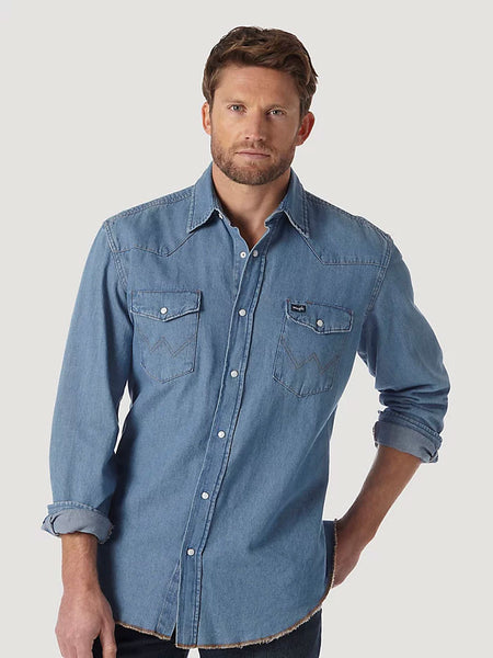 Wrangler 70127SW Mens Cowboy Cut Long Sleeve Western Denim Work Shirt Stonewash front view. If you need any assistance with this item or the purchase of this item please call us at five six one seven four eight eight eight zero one Monday through Saturday 10:00a.m EST to 8:00 p.m EST