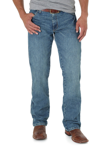 Wrangler 77MWZWO Mens Retro Jeans Slim Boot Worn front view. If you need any assistance with this item or the purchase of this item please call us at five six one seven four eight eight eight zero one Monday through Saturday 10:00a.m EST to 8:00 p.m EST