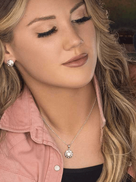 Montana Silversmiths NC5357 Womens Hidden Hearts Crystal Necklace Silver on model. If you need any assistance with this item or the purchase of this item please call us at five six one seven four eight eight eight zero one Monday through Saturday 10:00a.m EST to 8:00 p.m EST