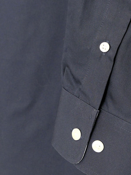 Ariat 10020330 Mens Wrinkle Free Solid Shirt Navy Blue cuff detail. If you need any assistance with this item or the purchase of this item please call us at five six one seven four eight eight eight zero one Monday through Saturday 10:00a.m EST to 8:00 p.m EST