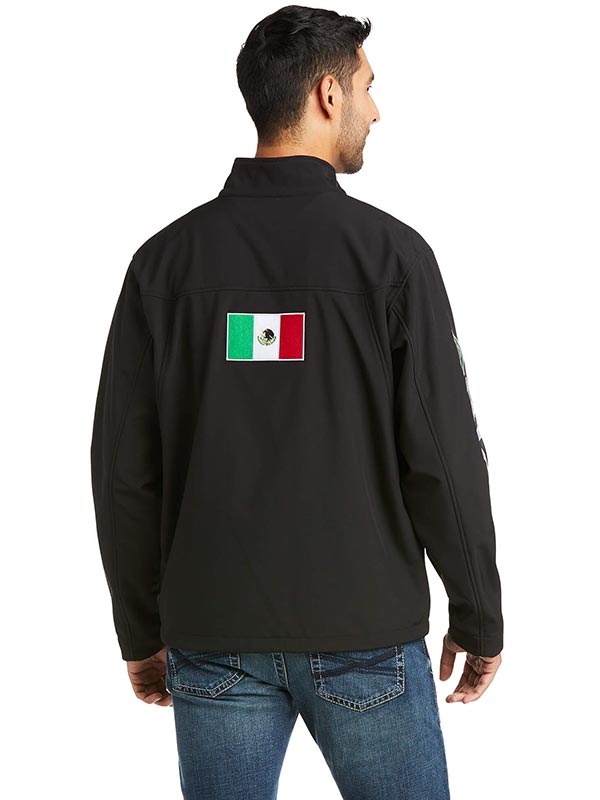 Ariat 10031424 Mens New Team Softshell Mexico Wtr Rstnt Jkt Black front view. If you need any assistance with this item or the purchase of this item please call us at five six one seven four eight eight eight zero one Monday through Saturday 10:00a.m EST to 8:00 p.m EST