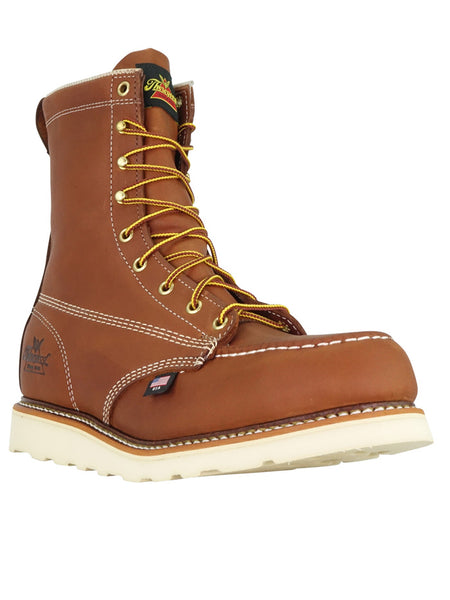 Thorogood 804-4208 Mens American Heritage 8 Inch Safety Toe Moc Tobacco FRONT SIDE ANGLE. If you need any assistance with this item or the purchase of this item please call us at five six one seven four eight eight eight zero one Monday through Saturday 10:00a.m EST to 8:00 p.m EST