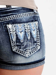 Grace in LA JHW51086 Womens Embellished Pocket Denim Shorts back pocket close up. If you need any assistance with this item or the purchase of this item please call us at five six one seven four eight eight eight zero one Monday through Saturday 10:00a.m EST to 8:00 p.m EST