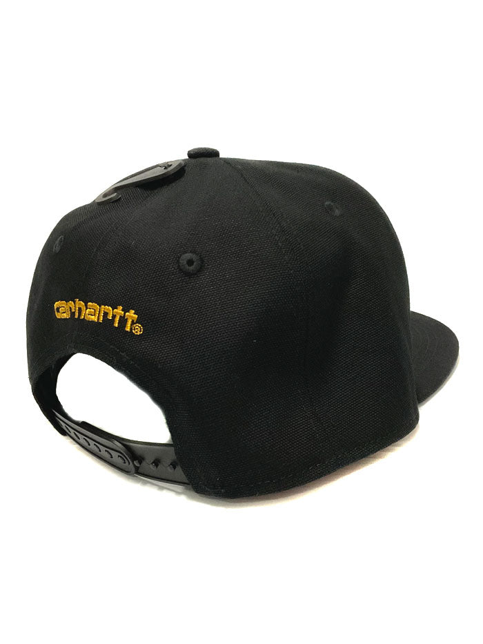 Carhartt 101604-001 Firm Duck Flat Brim Cap Black side / front view. If you need any assistance with this item or the purchase of this item please call us at five six one seven four eight eight eight zero one Monday through Saturday 10:00a.m EST to 8:00 p.m EST