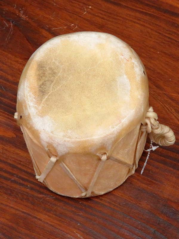 Native American Natural Cowhide Wooden Drum side view. If you need any assistance with this item or the purchase of this item please call us at five six one seven four eight eight eight zero one Monday through Saturday 10:00a.m EST to 8:00 p.m EST