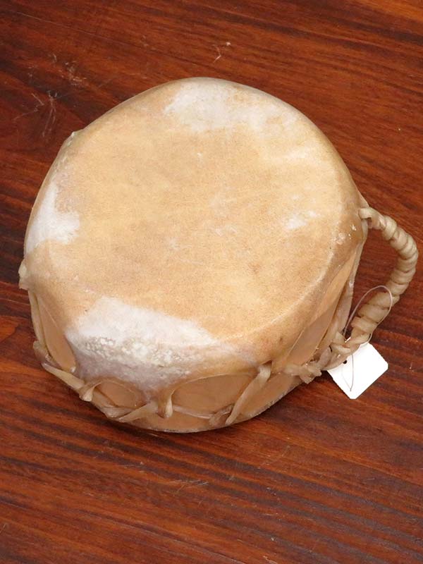 Native American Natural Cowhide Wooden Drum side view. If you need any assistance with this item or the purchase of this item please call us at five six one seven four eight eight eight zero one Monday through Saturday 10:00a.m EST to 8:00 p.m EST