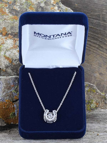 Montana Silversmiths NC3867 Womens Dancing With Luck Horseshoe Necklace Silver on box. If you need any assistance with this item or the purchase of this item please call us at five six one seven four eight eight eight zero one Monday through Saturday 10:00a.m EST to 8:00 p.m EST