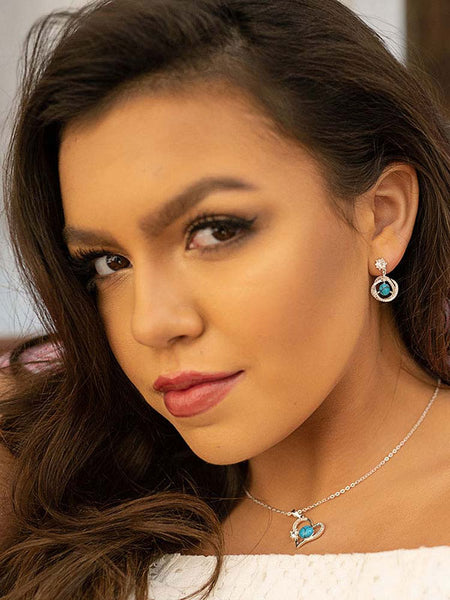 Montana Silversmiths NC4501 Open Heart Turquoise Pearl Necklace with a girl. If you need any assistance with this item or the purchase of this item please call us at five six one seven four eight eight eight zero one Monday through Saturday 10:00a.m EST to 8:00 p.m EST