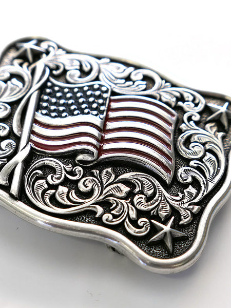 Nocona 37706 Rectangle Smooth Edge Scroll Stars USA Flag Belt Buckle Close up. If you need any assistance with this item or the purchase of this item please call us at five six one seven four eight eight eight zero one Monday through Saturday 10:00a.m EST to 8:00 p.m EST