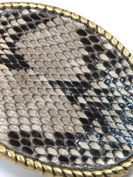 Skin Shop 121PB Snake Skin Solid Brass Belt Buckle Natural close up. If you need any assistance with this item or the purchase of this item please call us at five six one seven four eight eight eight zero one Monday through Saturday 10:00a.m EST to 8:00 p.m EST
