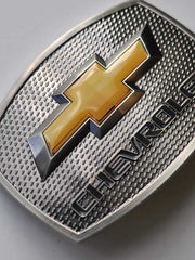 Western Express JD-117 Authentic Chevrolet Orange Logo Belt Buckle close up view. If you need any assistance with this item or the purchase of this item please call us at five six one seven four eight eight eight zero one Monday through Saturday 10:00a.m EST to 8:00 p.m EST