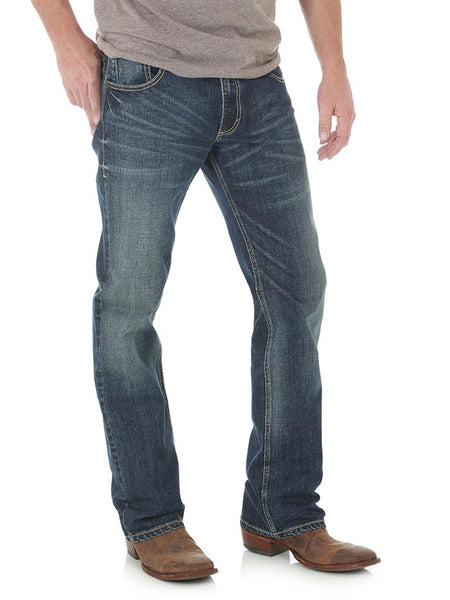Wrangler WLT77LY Mens Retro Layton Slim Fit Bootcut Jeans Medium Wash front view. If you need any assistance with this item or the purchase of this item please call us at five six one seven four eight eight eight zero one Monday through Saturday 10:00a.m EST to 8:00 p.m EST